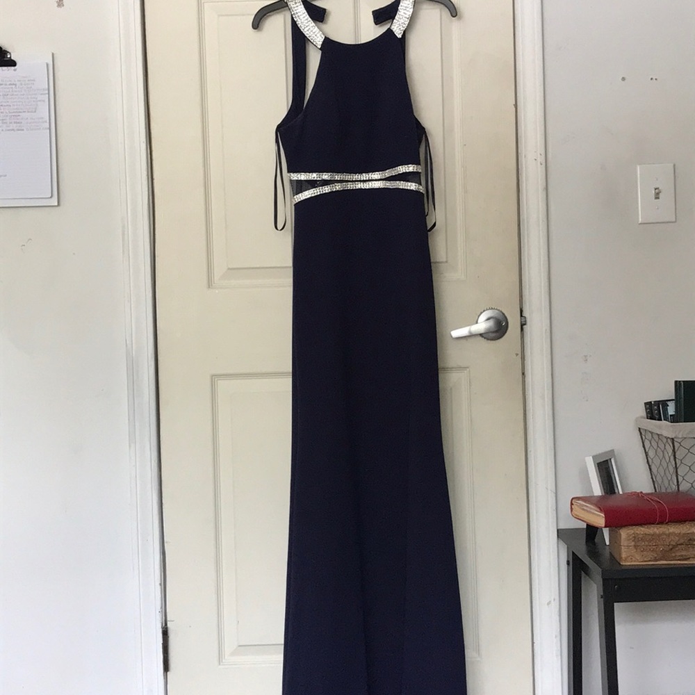 A halter neck navel blue prom dress